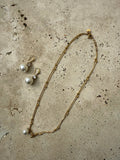 The Golden Pearl Necklace